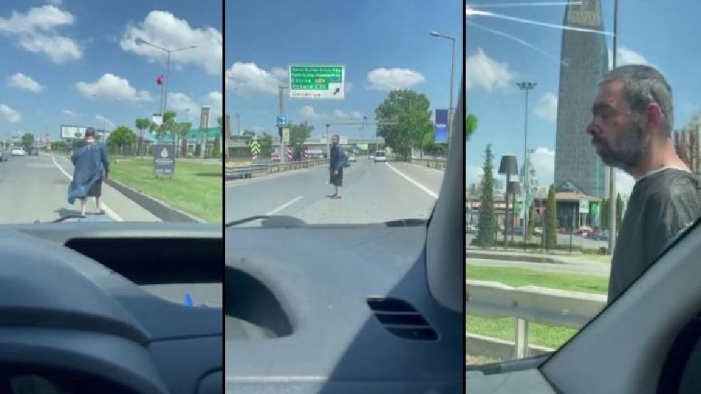 Görenleri şaşkına çevirdi: E-5'te ameliyat önlüğüyle yürüdü...